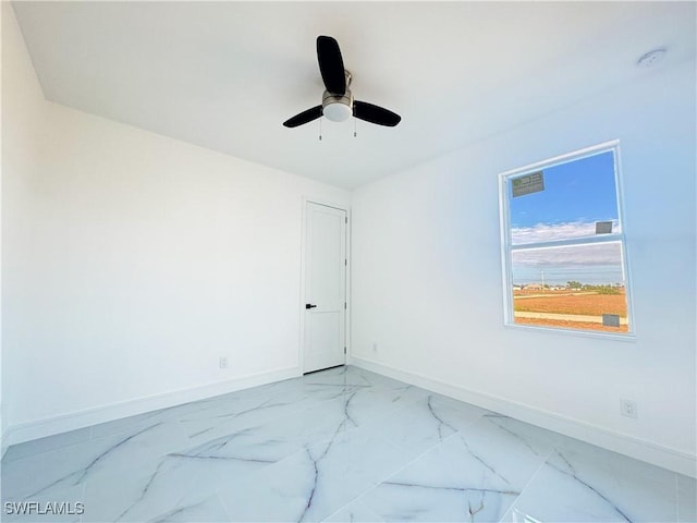 spare room featuring ceiling fan