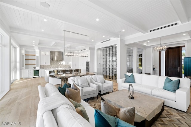 living room with wine cooler, light wood-type flooring, beam ceiling, wood ceiling, and a chandelier