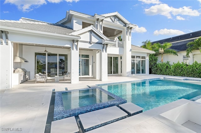 view of swimming pool featuring area for grilling, an in ground hot tub, a patio area, and ceiling fan