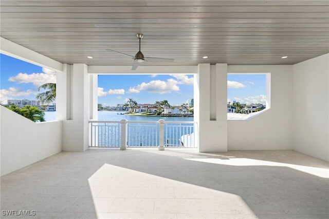 view of patio featuring a water view