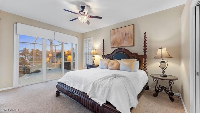 carpeted bedroom featuring ceiling fan and access to outside