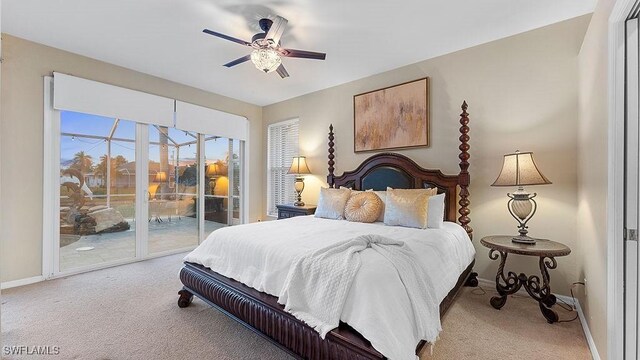 4212 SE 8th Pl, Cape Coral, FL 33904 - carpeted bedroom featuring baseboards, access to exterior, and ceiling fan