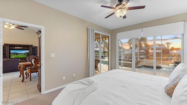 tiled bedroom featuring ceiling fan and access to outside