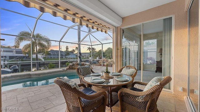 exterior space with a pool and plenty of natural light