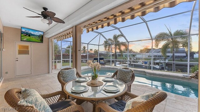 4212 SE 8th Pl, Cape Coral, FL 33904 - sunroom featuring a pool and a ceiling fan