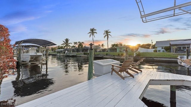 dock area with a water view