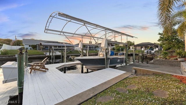 dock area with a water view