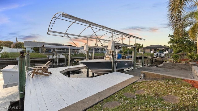 4212 SE 8th Pl, Cape Coral, FL 33904 - view of dock featuring boat lift