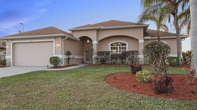 4212 SE 8th Pl, Cape Coral, FL 33904 - mediterranean / spanish-style home featuring stucco siding, an attached garage, a front lawn, and concrete driveway