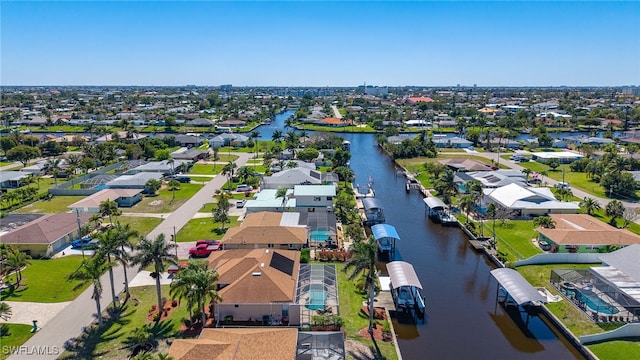 4212 SE 8th Pl, Cape Coral, FL 33904 - drone / aerial view featuring a water view and a residential view