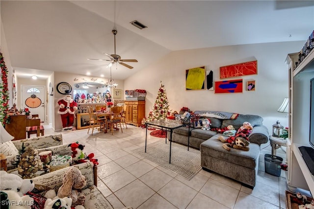 tiled living room with vaulted ceiling and ceiling fan