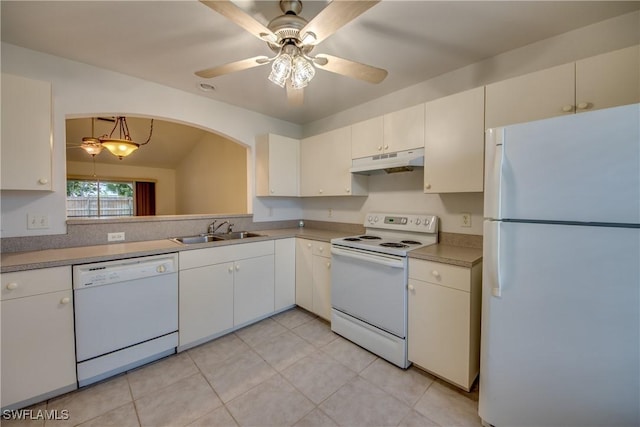 kitchen with light tile patterned floors, white appliances, ceiling fan, and sink