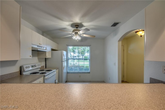 kitchen featuring white cabinetry, ceiling fan, and white appliances