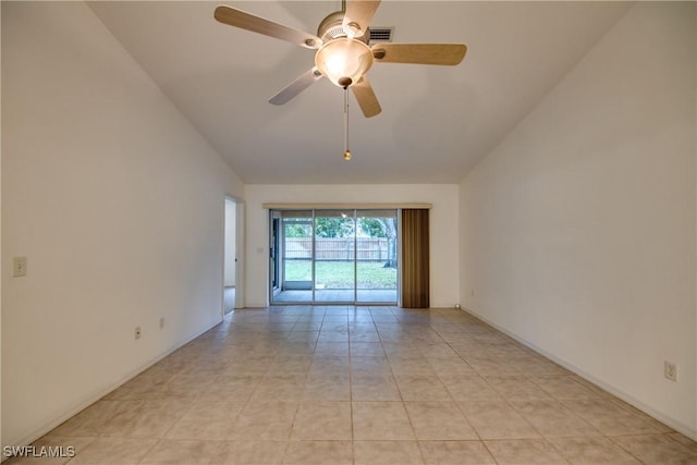 unfurnished room with light tile patterned floors, ceiling fan, and lofted ceiling