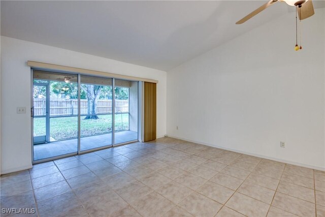 unfurnished room with ceiling fan and light tile patterned flooring