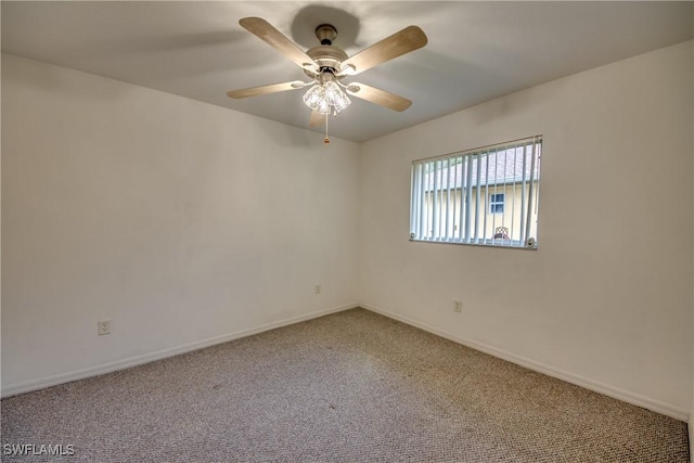 spare room with ceiling fan and carpet floors