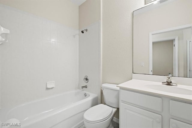 full bathroom featuring vanity, toilet, and tiled shower / bath