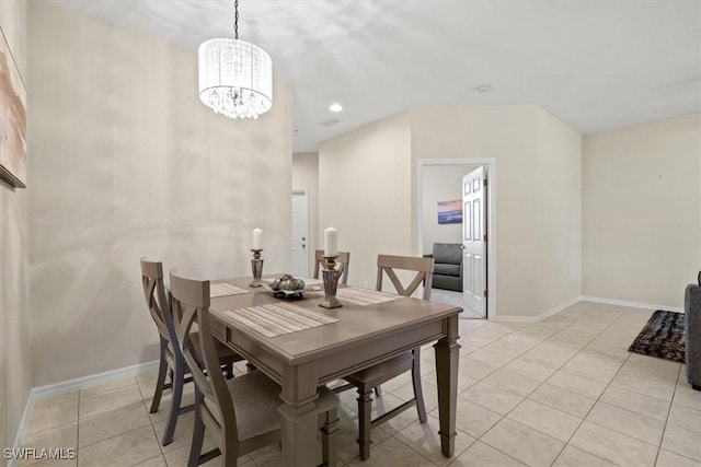 tiled dining area with a notable chandelier