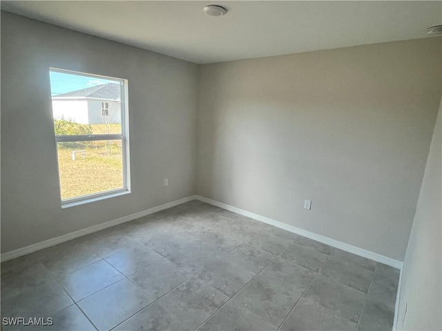 view of tiled spare room