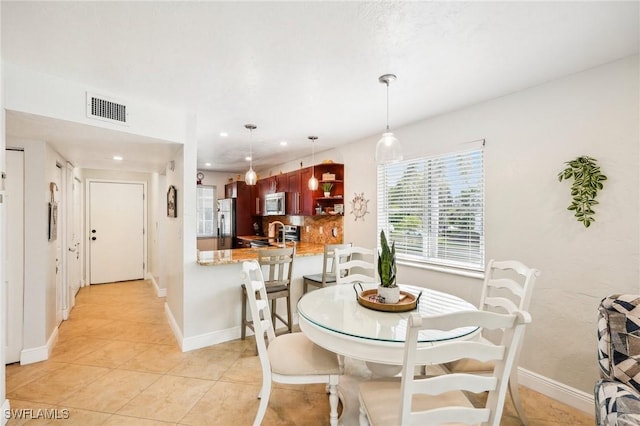 view of tiled dining space