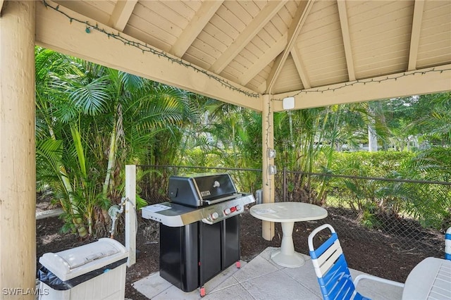 view of patio featuring a gazebo and a grill