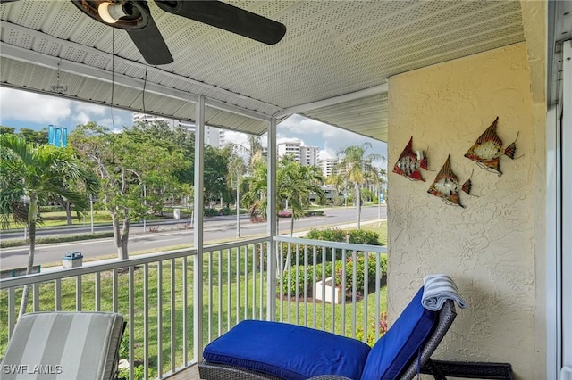 sunroom / solarium with ceiling fan