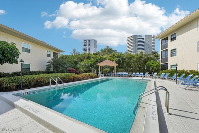 view of pool with a gazebo and a patio