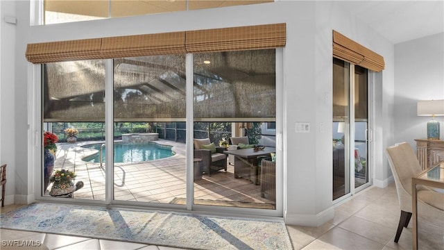 entryway featuring tile patterned floors and a wealth of natural light