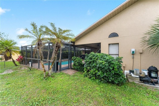 view of yard with a lanai