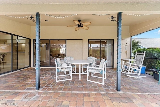 view of patio / terrace featuring ceiling fan