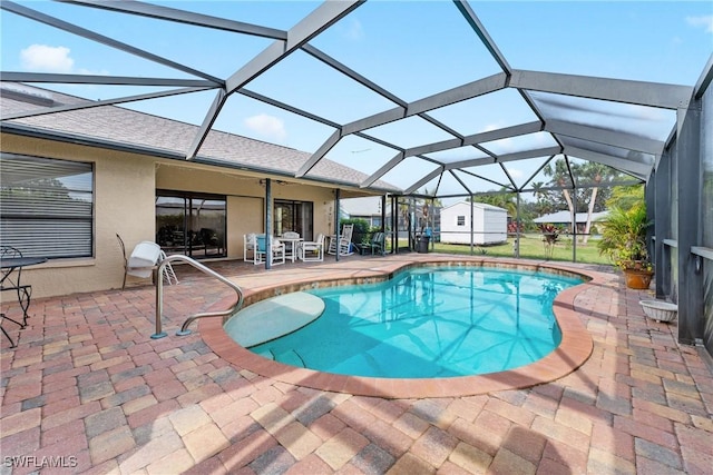 view of pool featuring a patio and a lanai