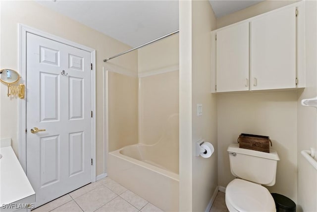 full bathroom with tile patterned floors, washtub / shower combination, vanity, and toilet