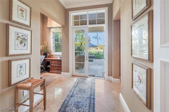 doorway with built in desk and ornamental molding