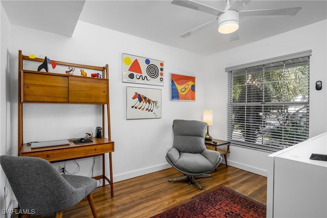 interior space featuring ceiling fan and dark wood-type flooring