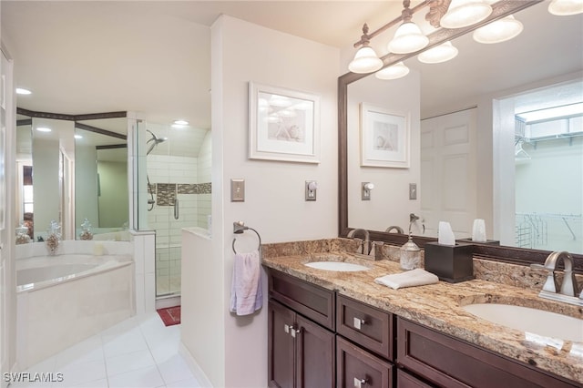 bathroom with separate shower and tub, tile patterned flooring, and vanity