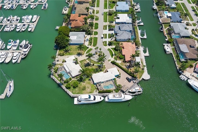 bird's eye view with a water view