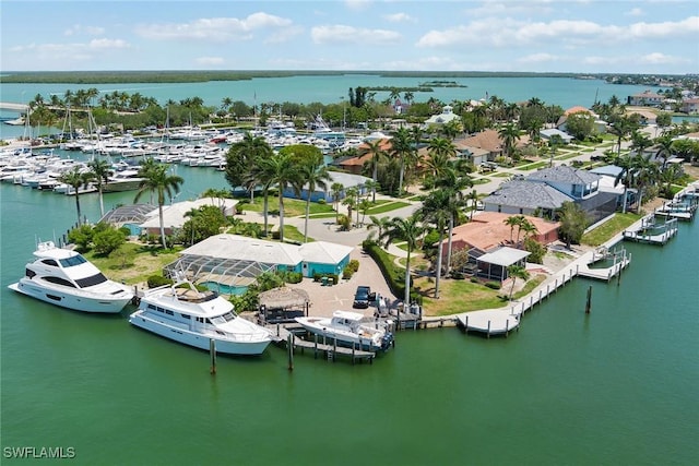 birds eye view of property featuring a water view