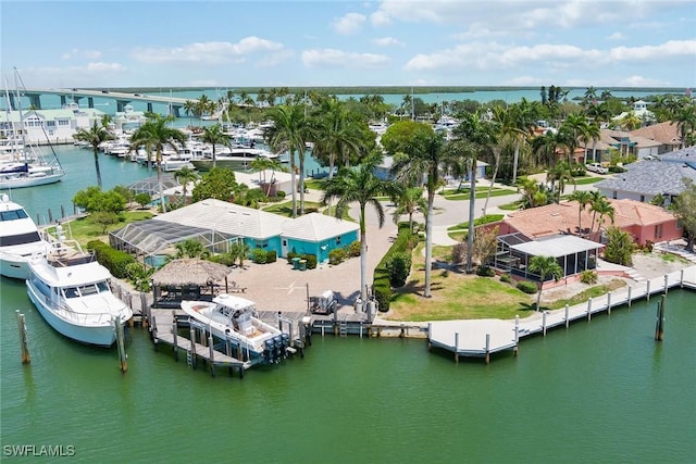 birds eye view of property featuring a water view