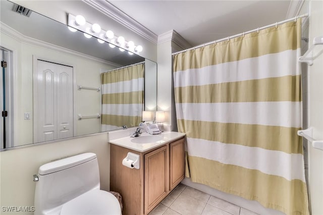 bathroom featuring crown molding, tile patterned flooring, vanity, and toilet