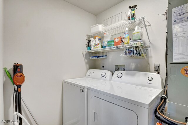 laundry area featuring laundry area and separate washer and dryer