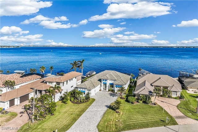 birds eye view of property featuring a water view