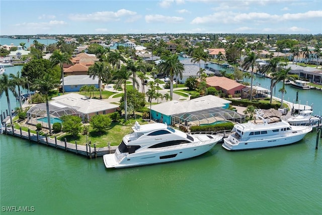 drone / aerial view featuring a water view