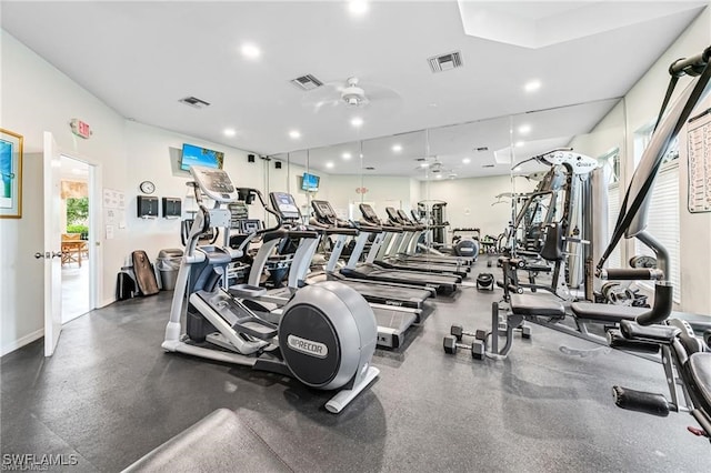 exercise room with ceiling fan