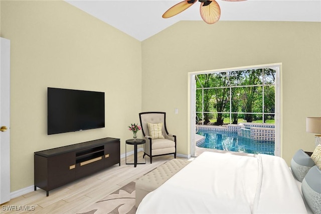 bedroom featuring ceiling fan, light hardwood / wood-style flooring, and vaulted ceiling