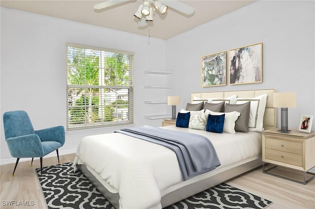 bedroom with light wood-type flooring and ceiling fan