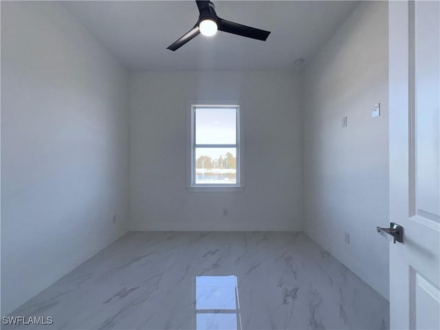 spare room featuring ceiling fan