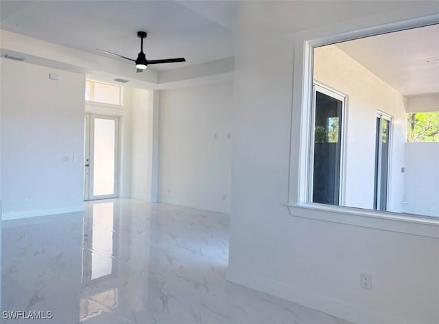 empty room featuring ceiling fan