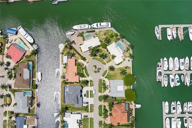 birds eye view of property featuring a water view