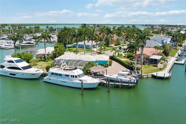 birds eye view of property featuring a water view