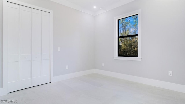 unfurnished bedroom with a closet